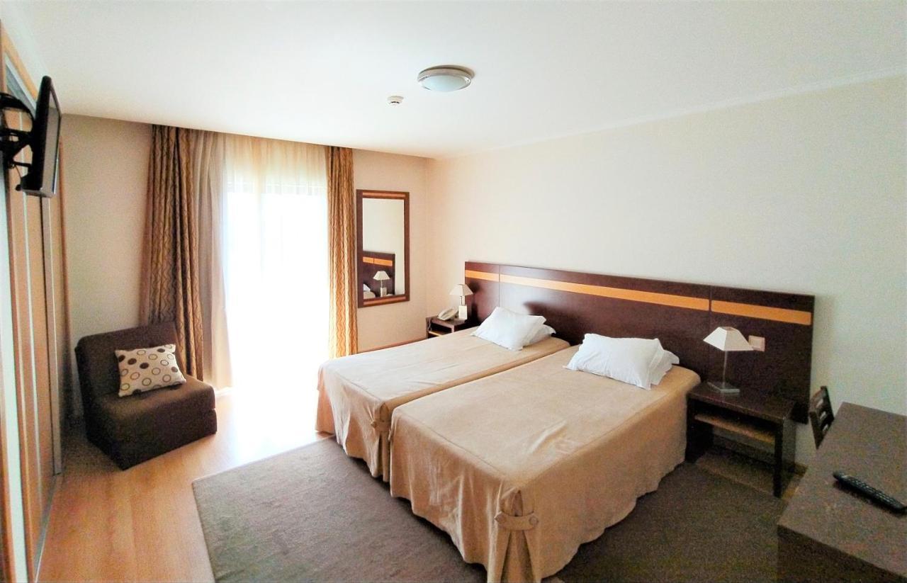 Quarto Twin com Varanda
