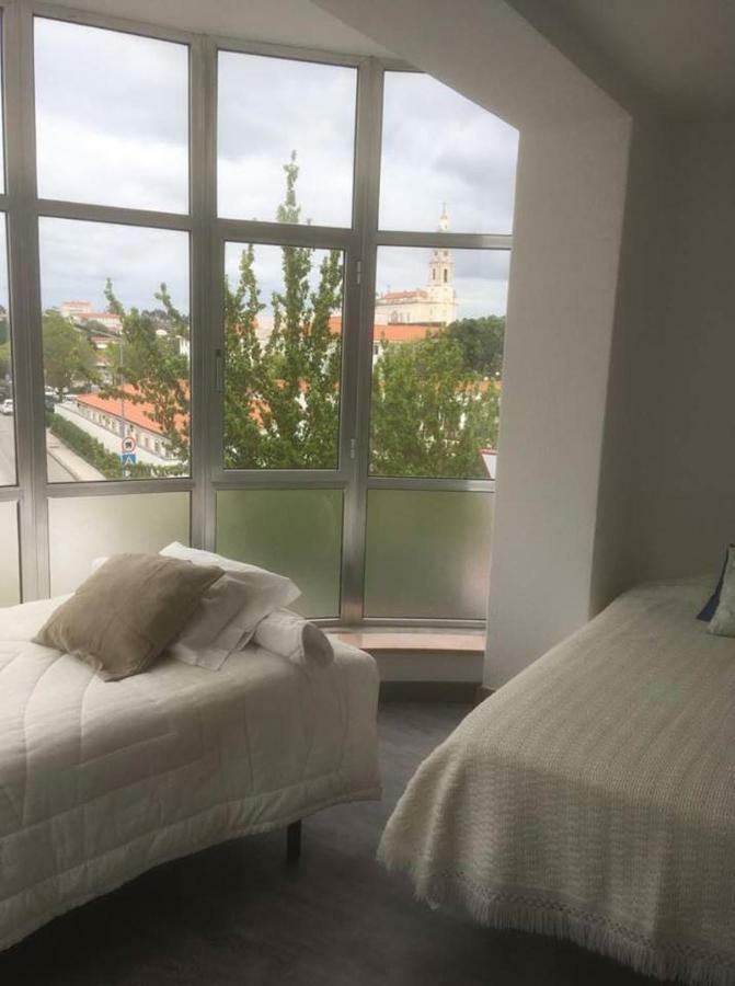 Quarto Triplo com Casa de Banho Privativa